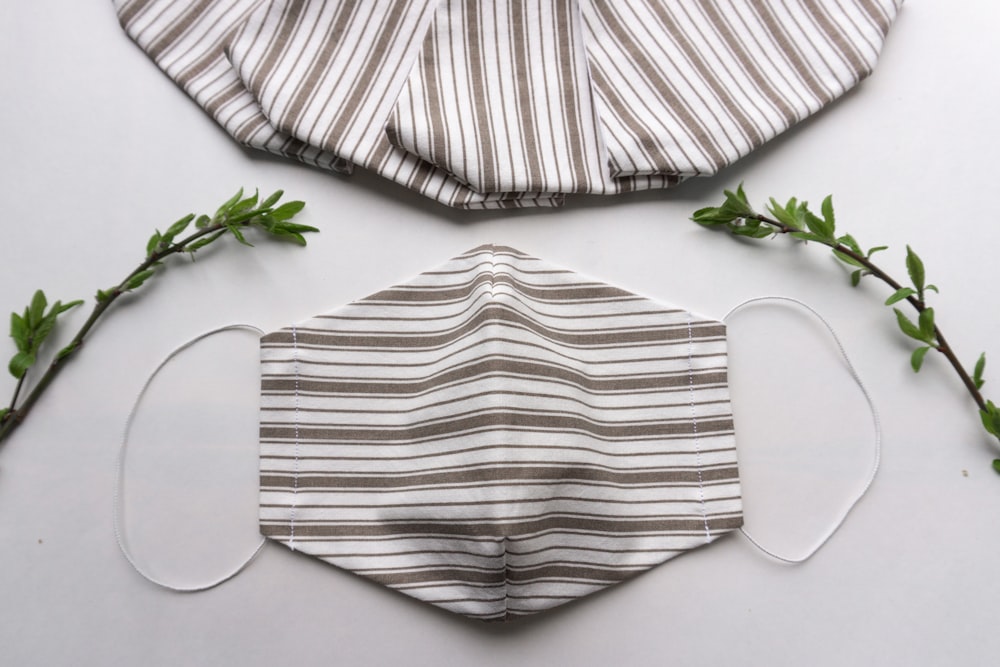 white and black striped textile