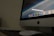 A close-up of a computer screen displaying advanced security software in a stylish workspace.