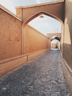 Cozy New Mexico courtyard with traditional adobe walls and starburst light effects.
