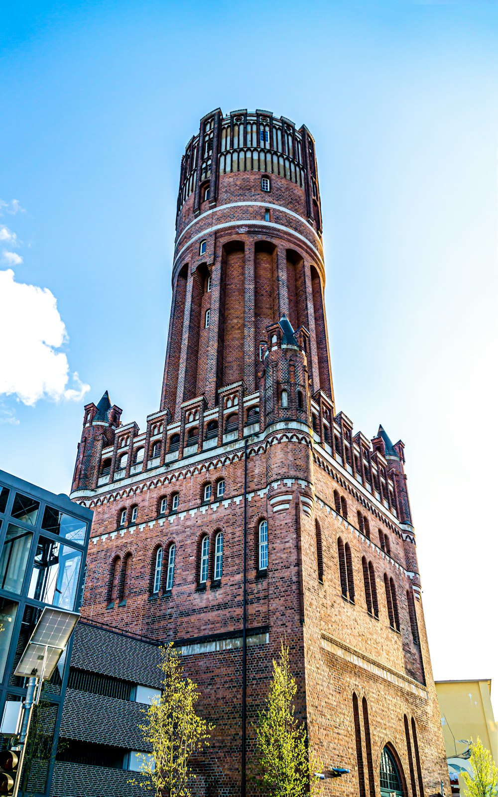 brown concrete building under blue sky during daytime