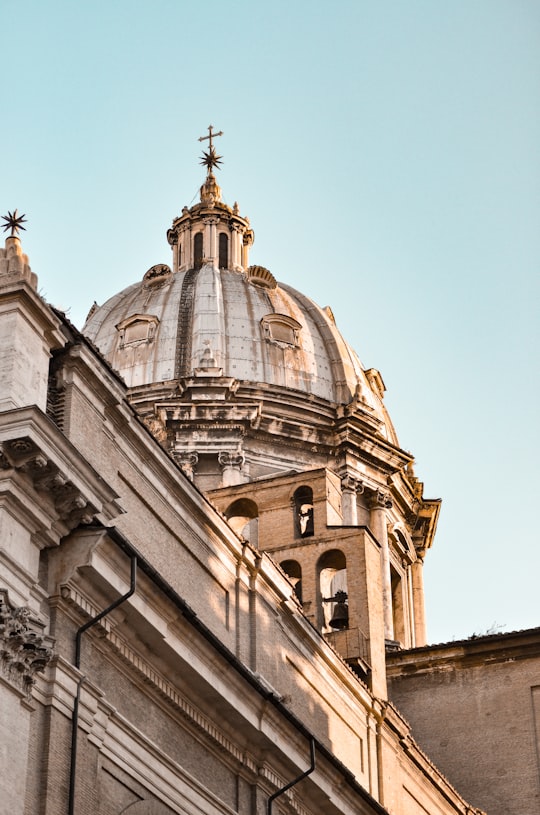 brown and white concrete building in Sant'Andrea della Valle Italy