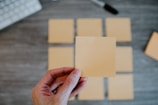 person holding white printer paper