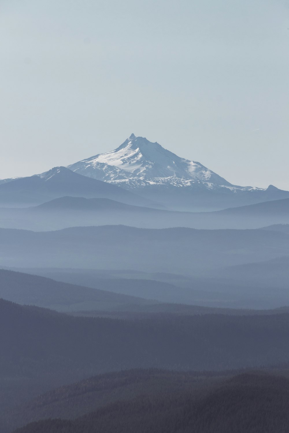 snow covered mountain during daytime