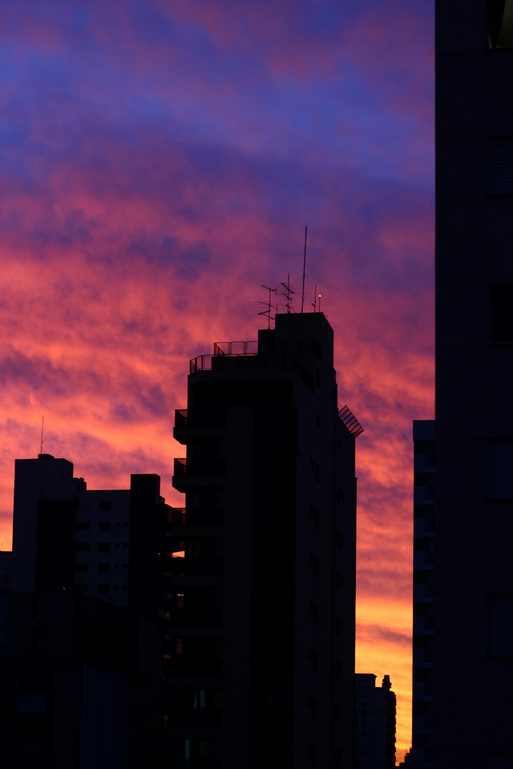 silhouette of building during sunset