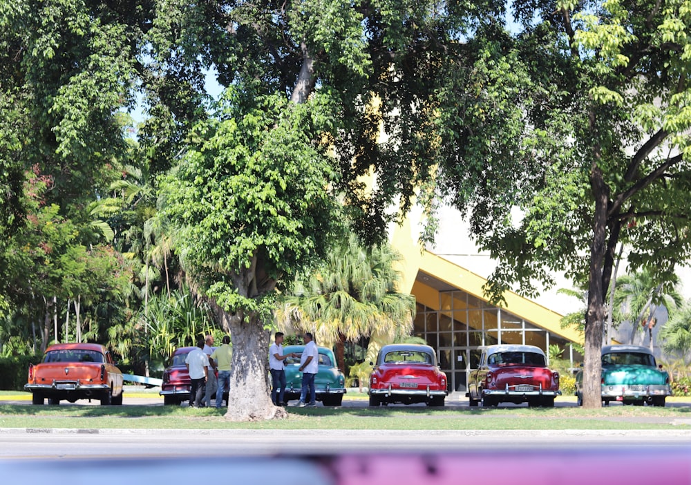 cars parked in front of building during daytime