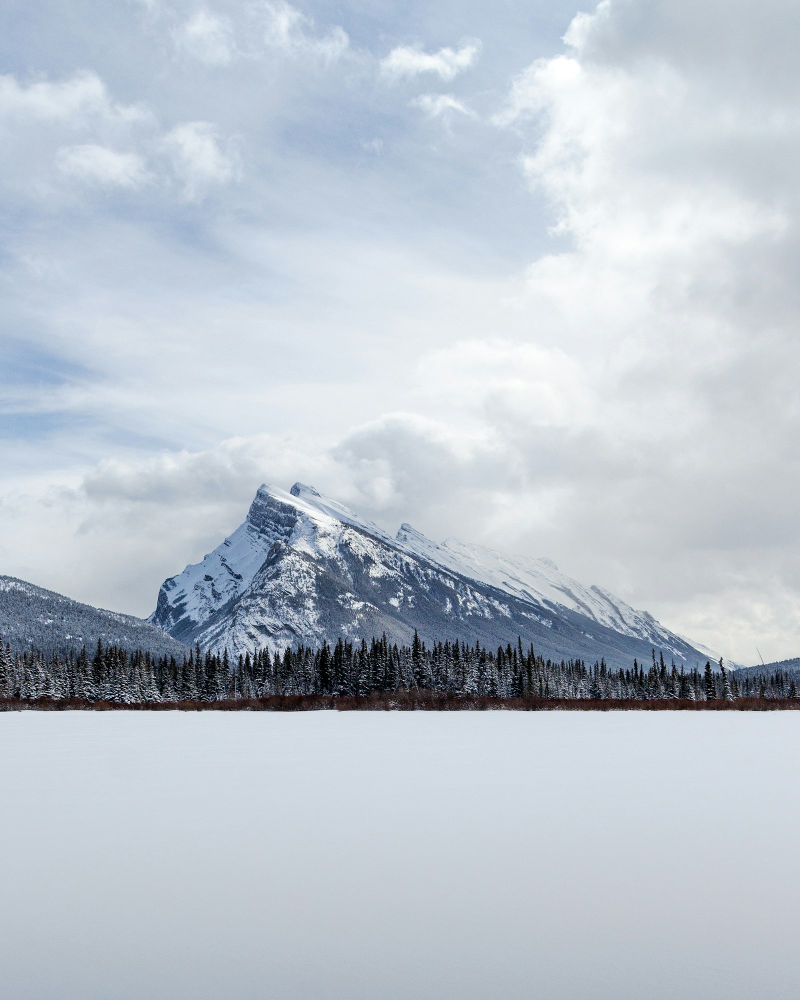 Canon EOS 700D (EOS Rebel T5i / EOS Kiss X7i) + Canon EF-S 10-22mm F3.5-4.5 USM sample photo. Snow covered mountain under photography