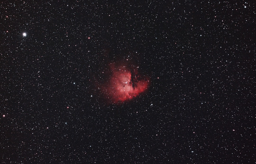 red and black galaxy with stars