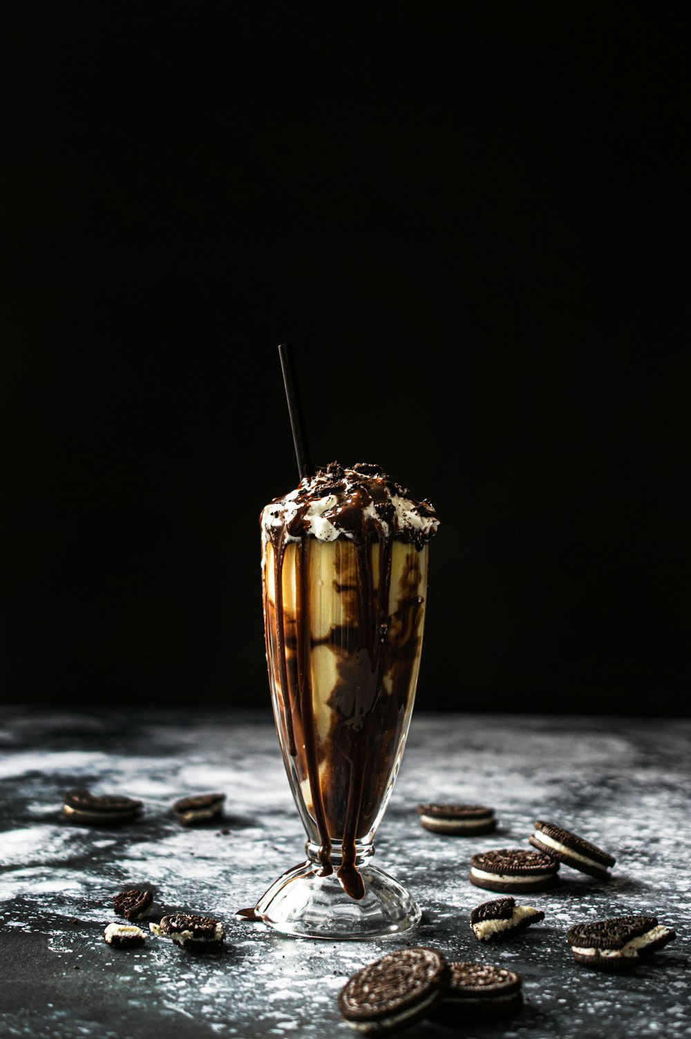 clear glass cup with brown liquid