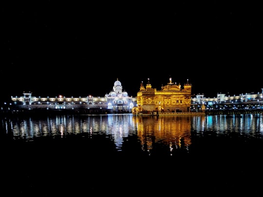 city skyline during night time in Harmandir Sahib India