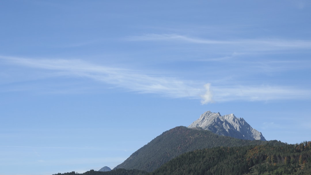 green and white mountains under blue sky during daytime