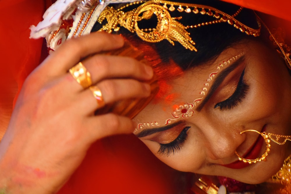 woman in gold and silver ring