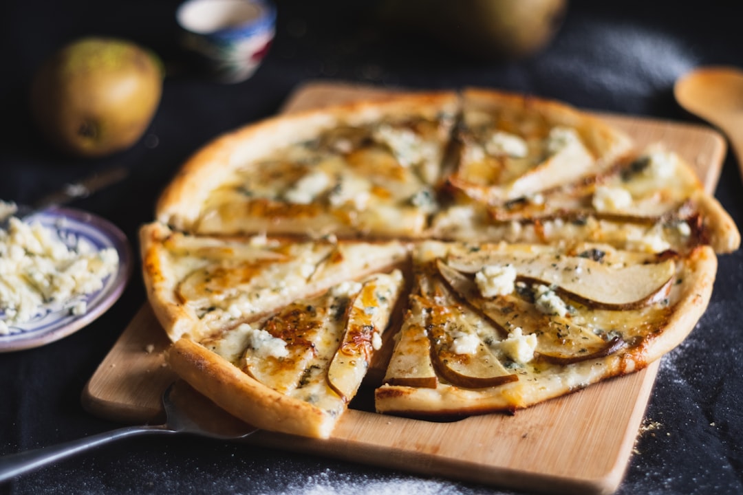 pizza on brown wooden table