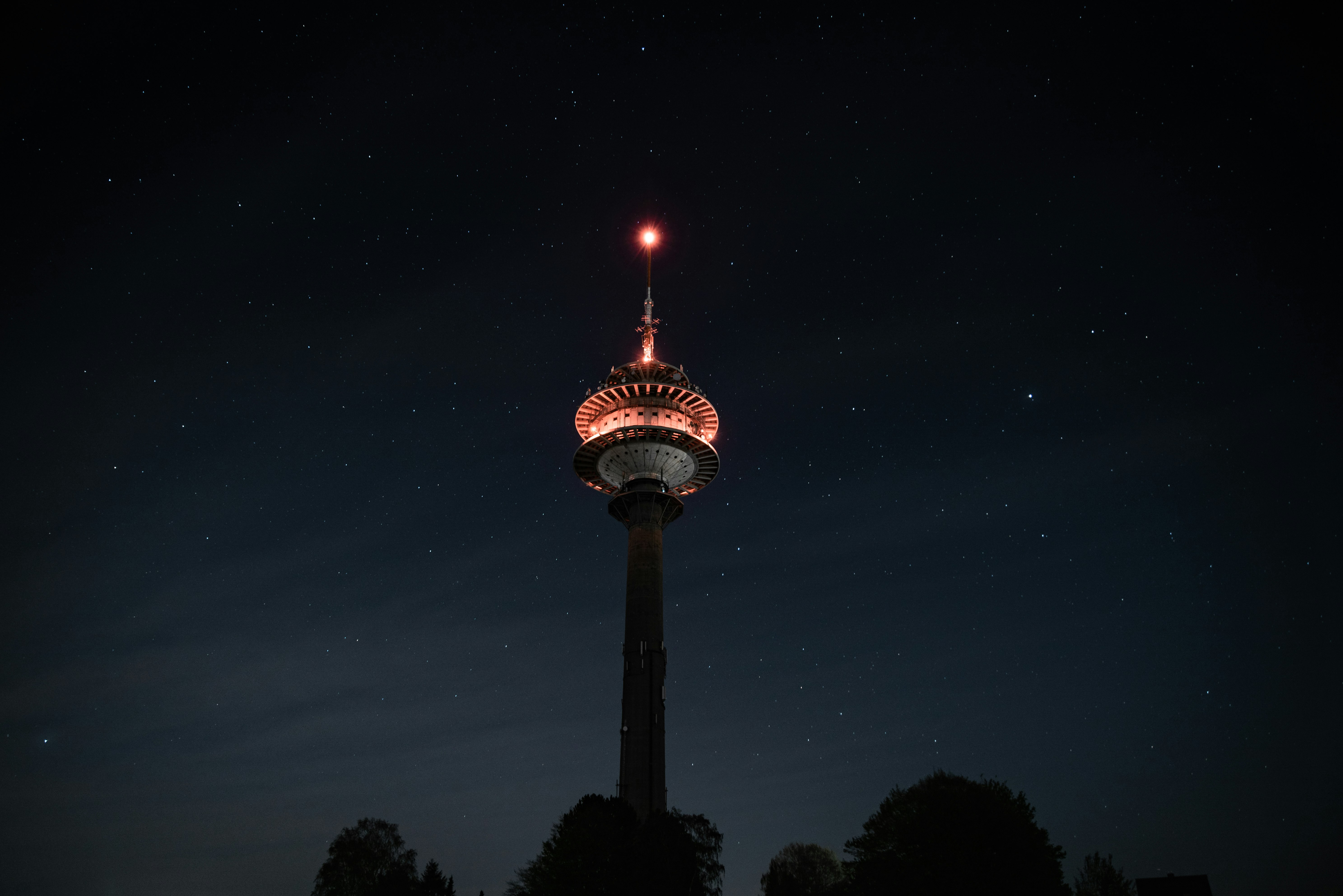 lighted lamp post during night time