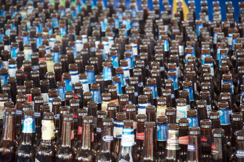 brown glass bottles on brown wooden table