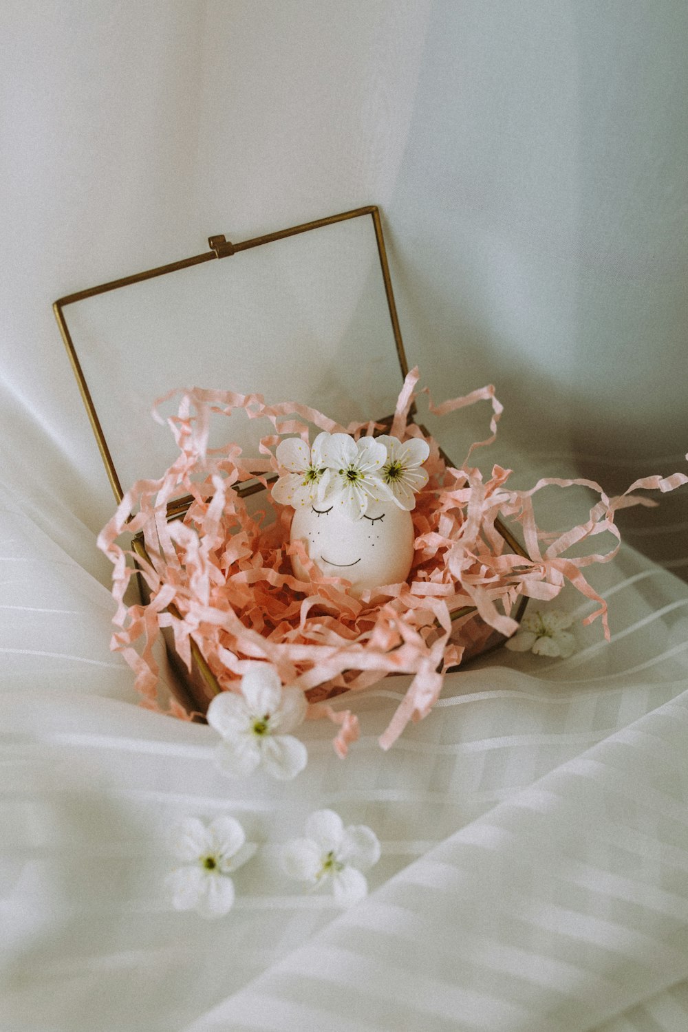 pink rose bouquet on white textile