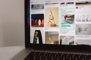 A laptop screen showing an optimized Airbnb listing with attractive photos and upsell options.