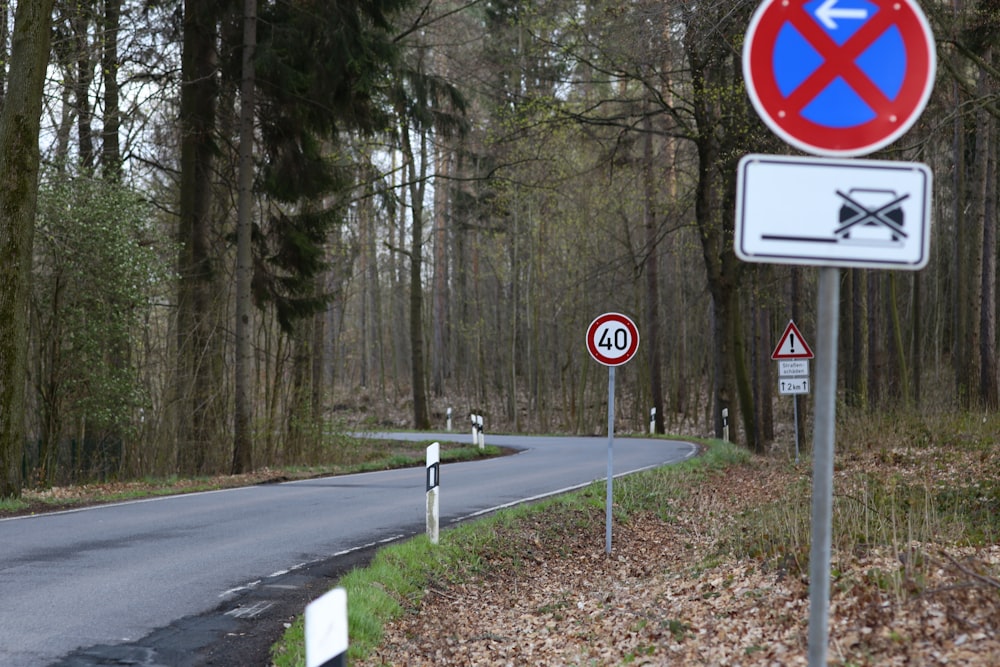 red and white stop sign on road