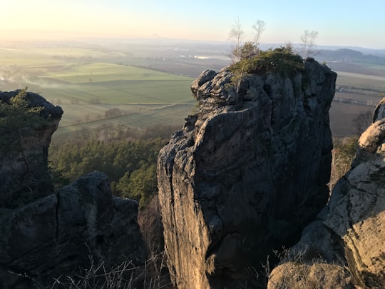 brown rock formation during daytime in Bohemian Paradise Czech Republic