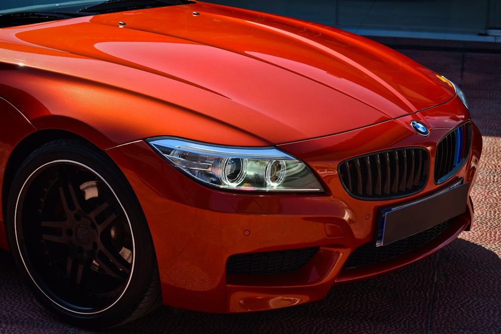 orange car with black wheel