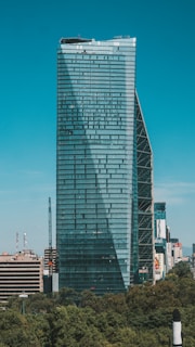gray high rise building under blue sky during daytime