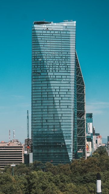 gray high rise building under blue sky during daytime