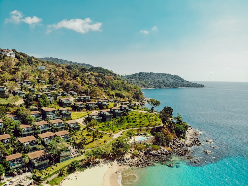 houses near body of water during daytime