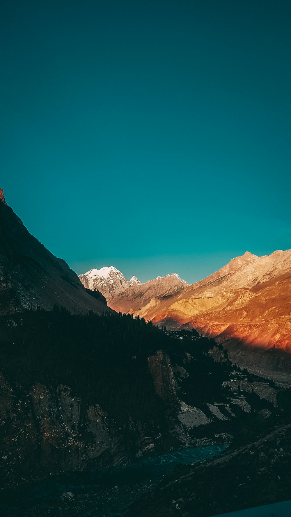 brown and white mountains under blue sky during daytime