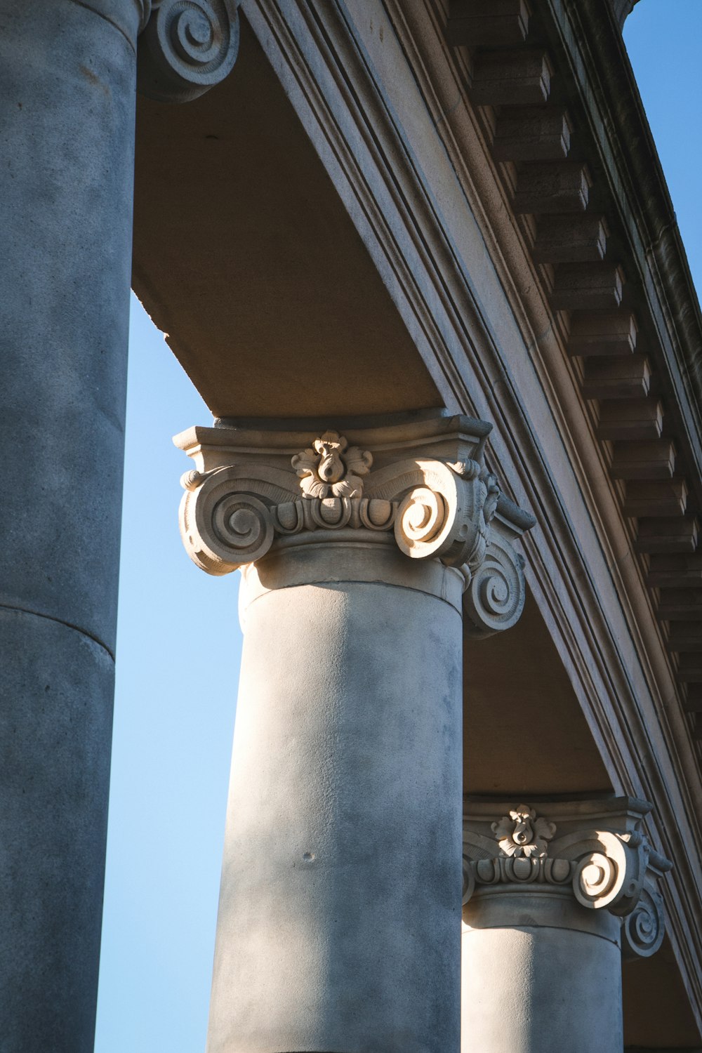gray concrete pillar under blue sky during daytime