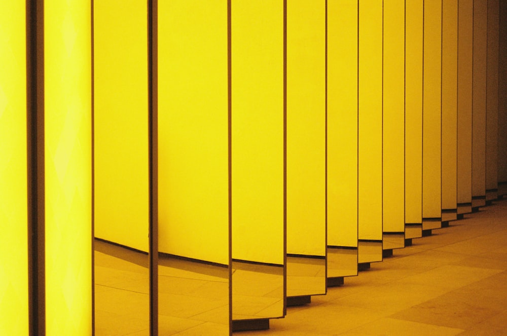 yellow wooden wall during daytime