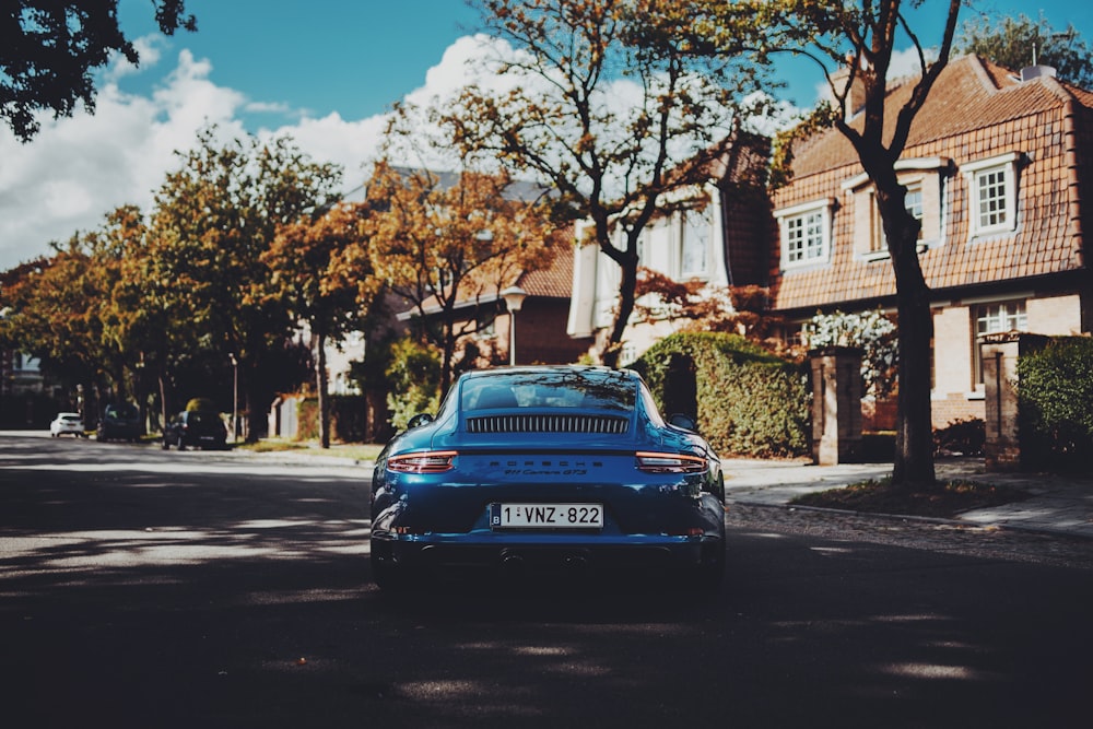 blue audi a 4 on road during daytime