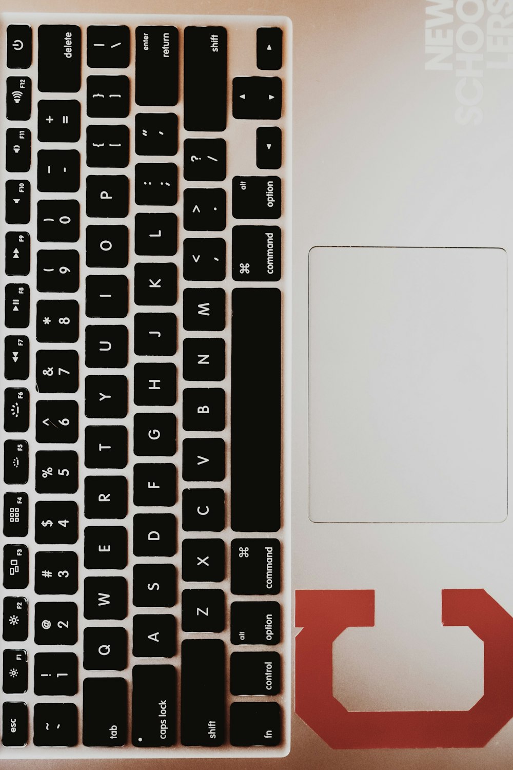 white and red laptop computer