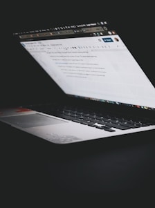 black and silver laptop computer