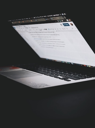 black and silver laptop computer