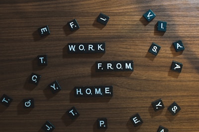 a wooden table topped with scrabbled letters
