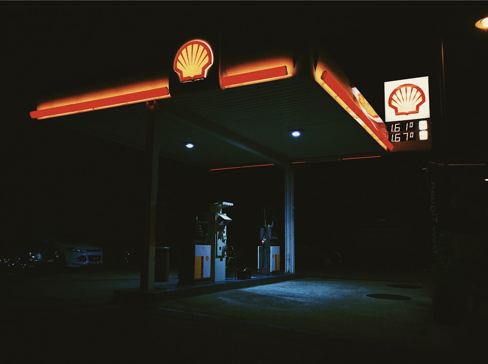 a shell gas station lit up at night