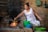 woman in white and pink floral tank top cooking