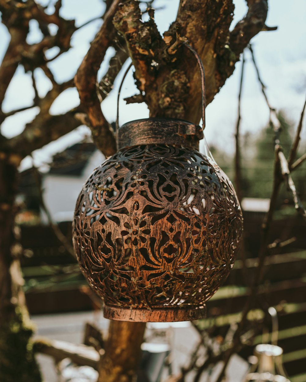 brown and black floral ceramic vase