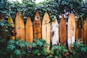 brown wooden clothes hangers on green plants