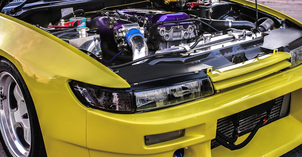 yellow and black car engine bay