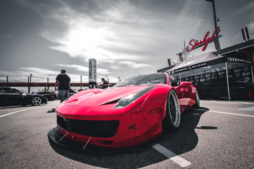 red ferrari 458 italia on road