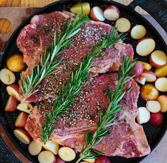 cooked meat on black plate