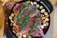 cooked meat on black plate