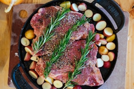 cooked meat on black plate