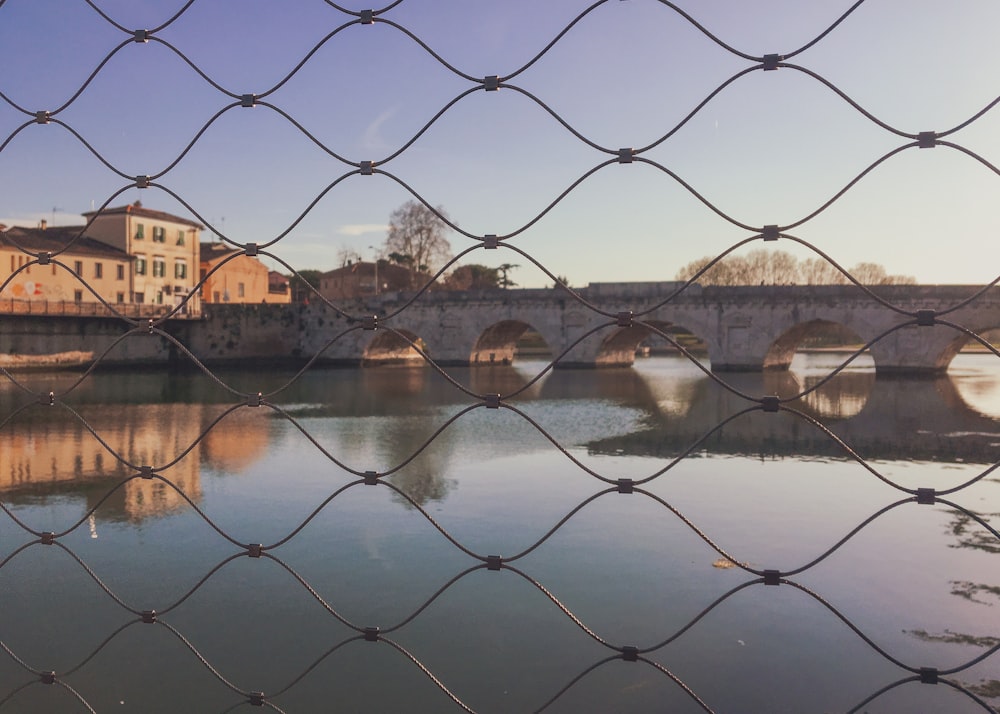 brown concrete building near bridge