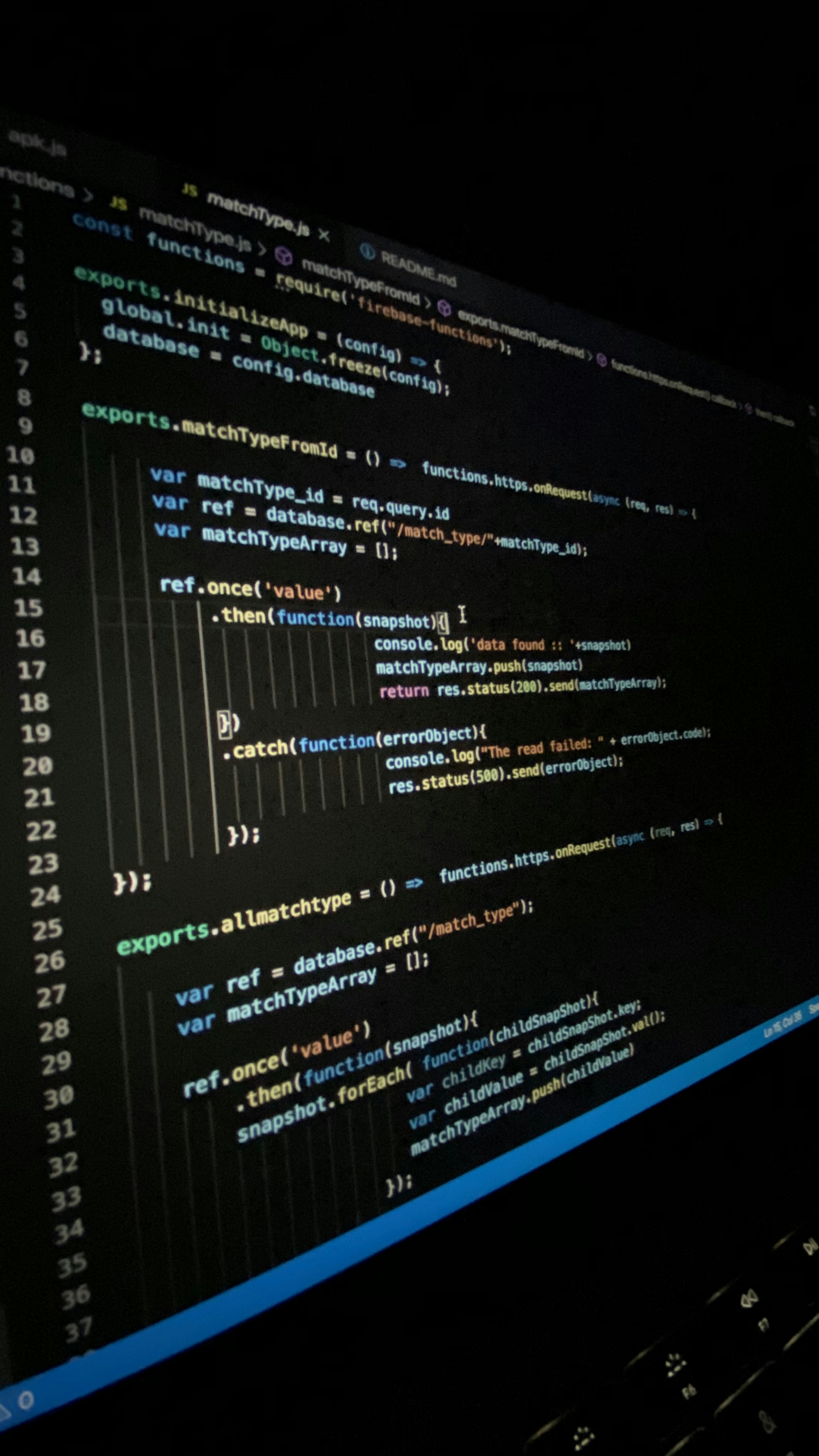 Dark code editor showing JavaScript code with blue syntax highlighting on black screen