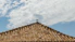 Before and after view of a rooftop waterproofing project in Puerto Vallarta under bright sunlight