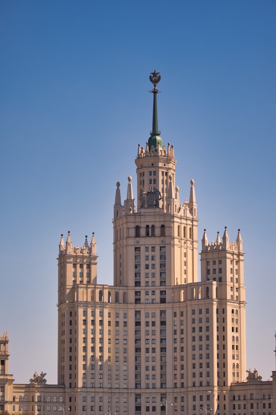 white concrete building under blue sky during daytime in Kotelnicheskaya Embankment Russia