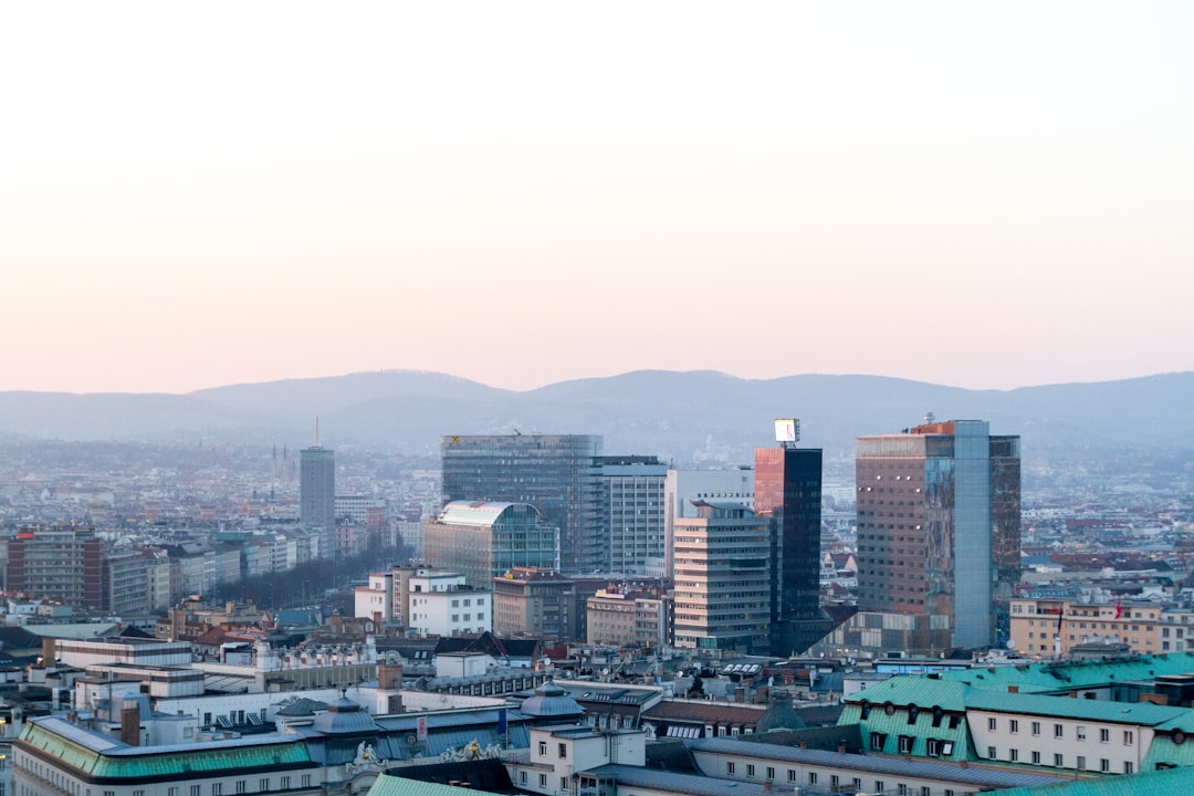 city skyline under white sky during daytime