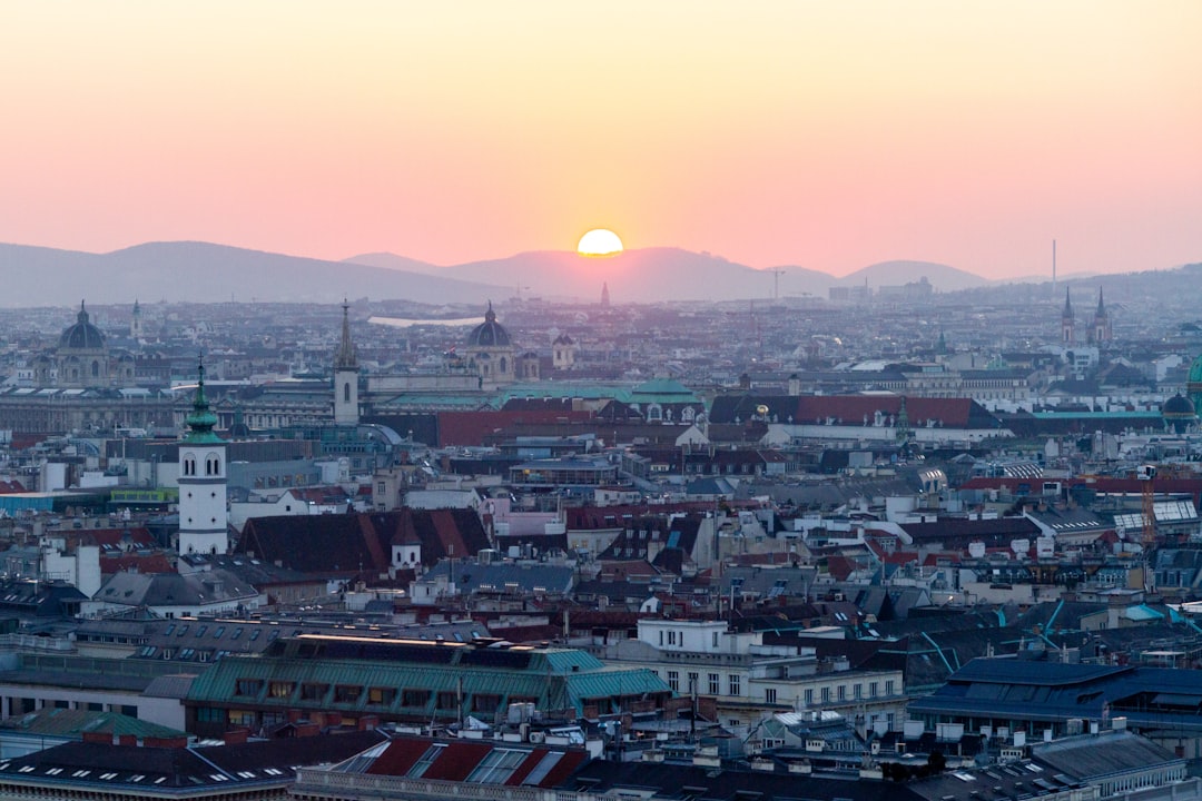 city skyline during sunset with orange sky