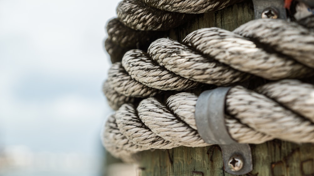 brown rope on brown wooden post